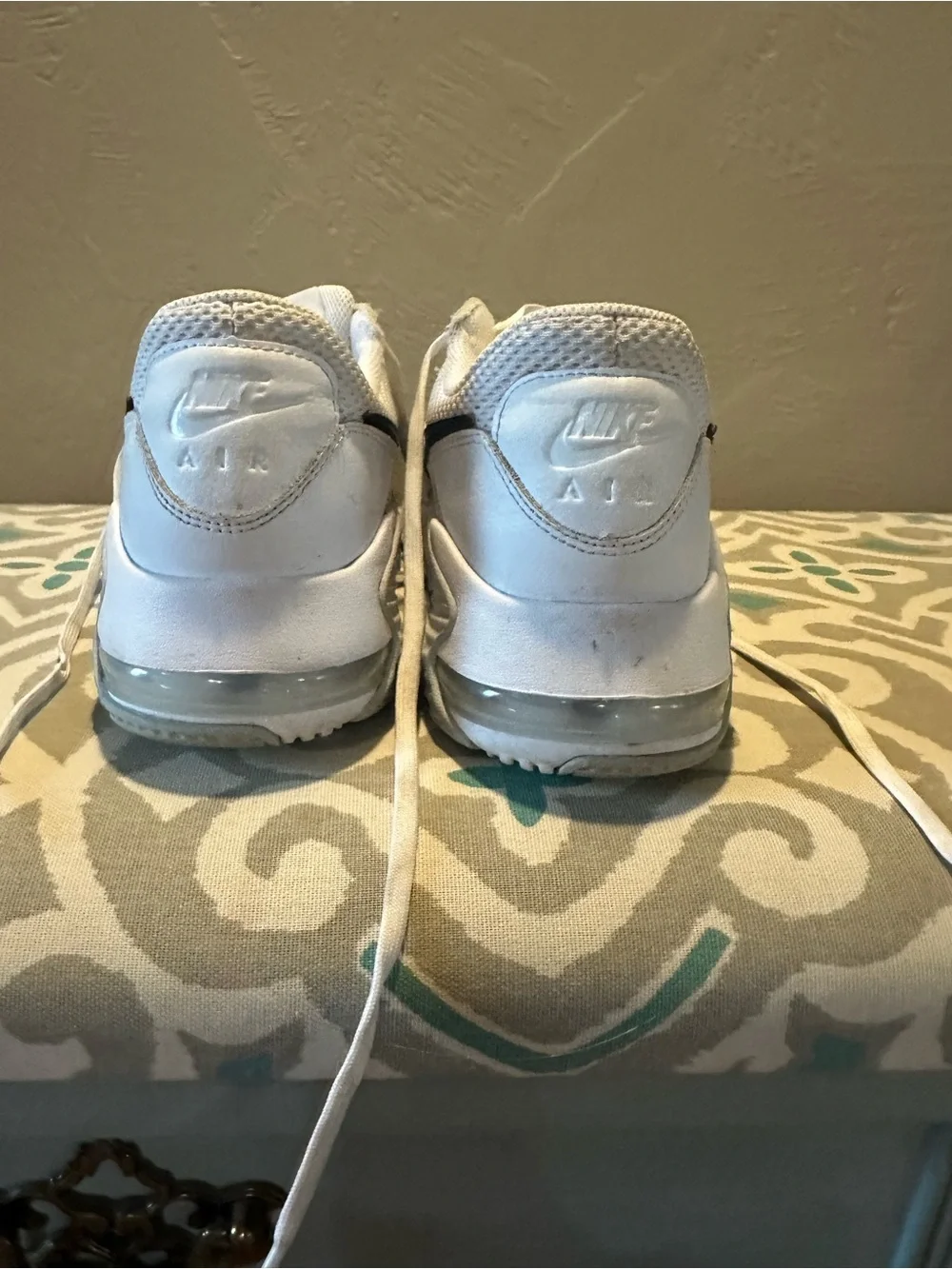 Nike Men’s White Athletic Sneakers with Black Swoosh